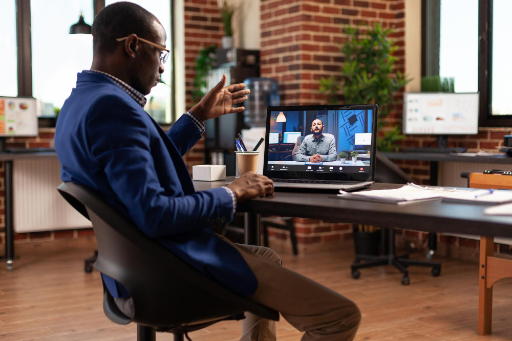 entrepreneur-using-video-call-conference-laptop-talk-colleague-startup-office-business-man-attending-online-teleconference-meeting-with-person-discuss-project-strategy